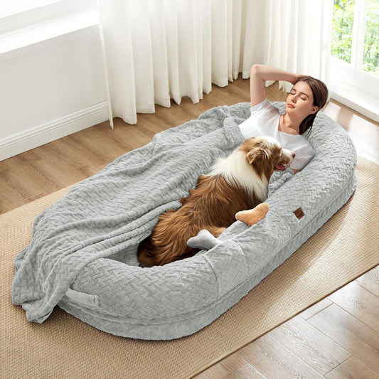 Large comfortable dog bed, plush material with raised edges.