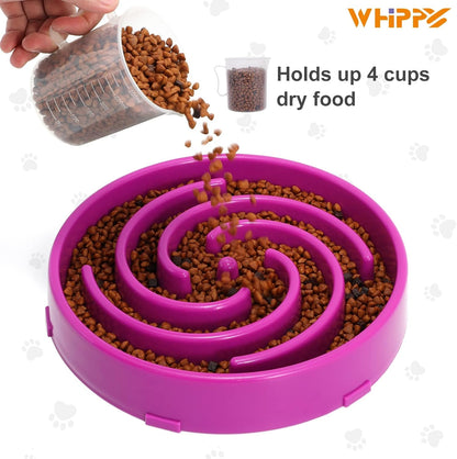 Filling a purple slow feeder bowl with dry dog food.